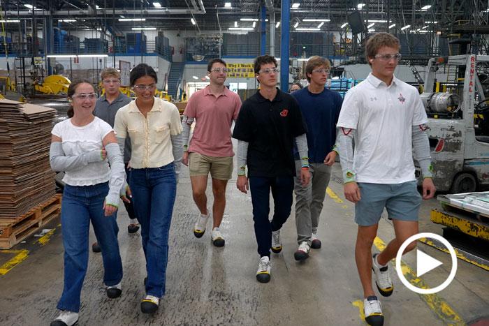 students tour the factory